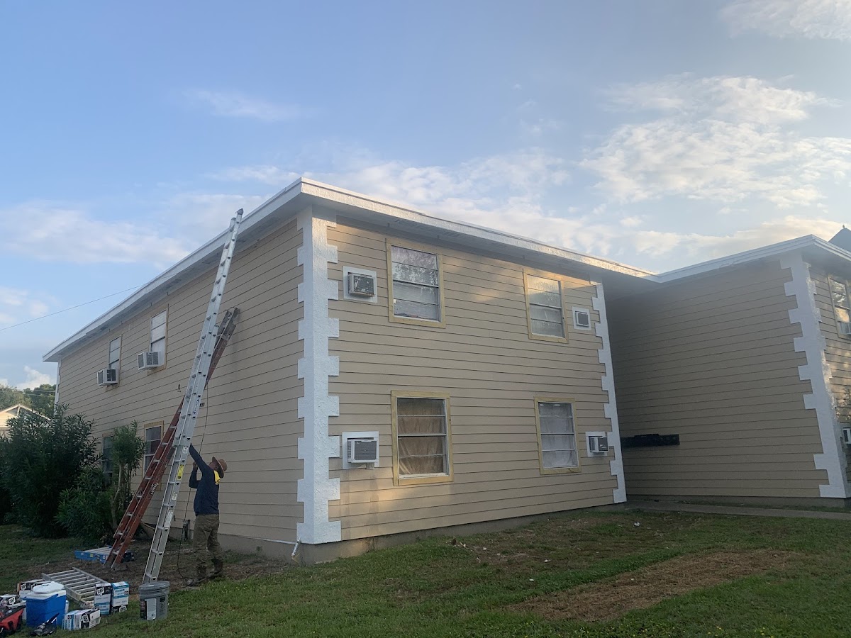 Exterior house painting in progress, Galveston TX